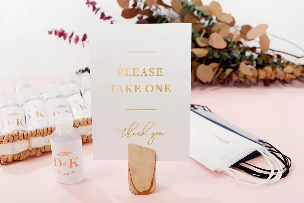 setting up sanitation stations near your seating will remind guests to consistently keep clean