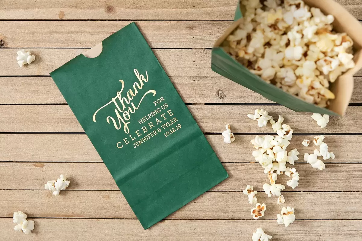 Create custom party favor bags for pre-packaged snacks at your wedding.