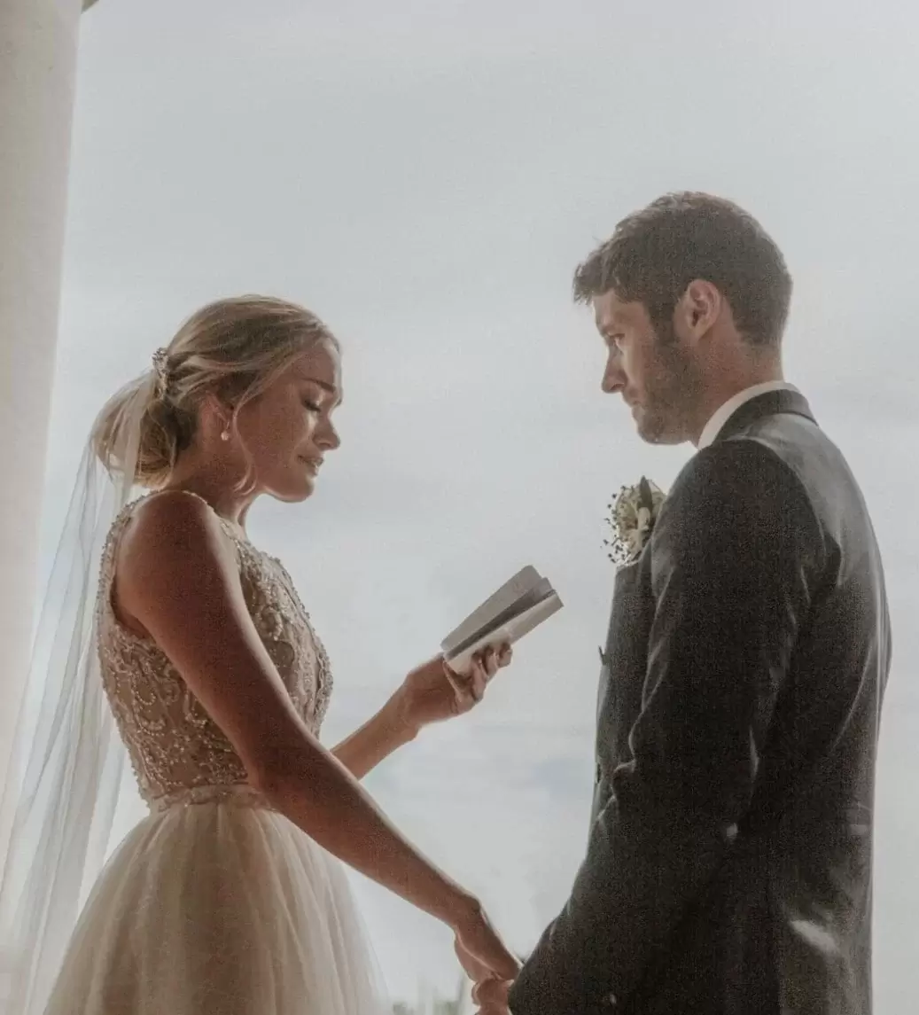 bride and groom saying their wedding vows