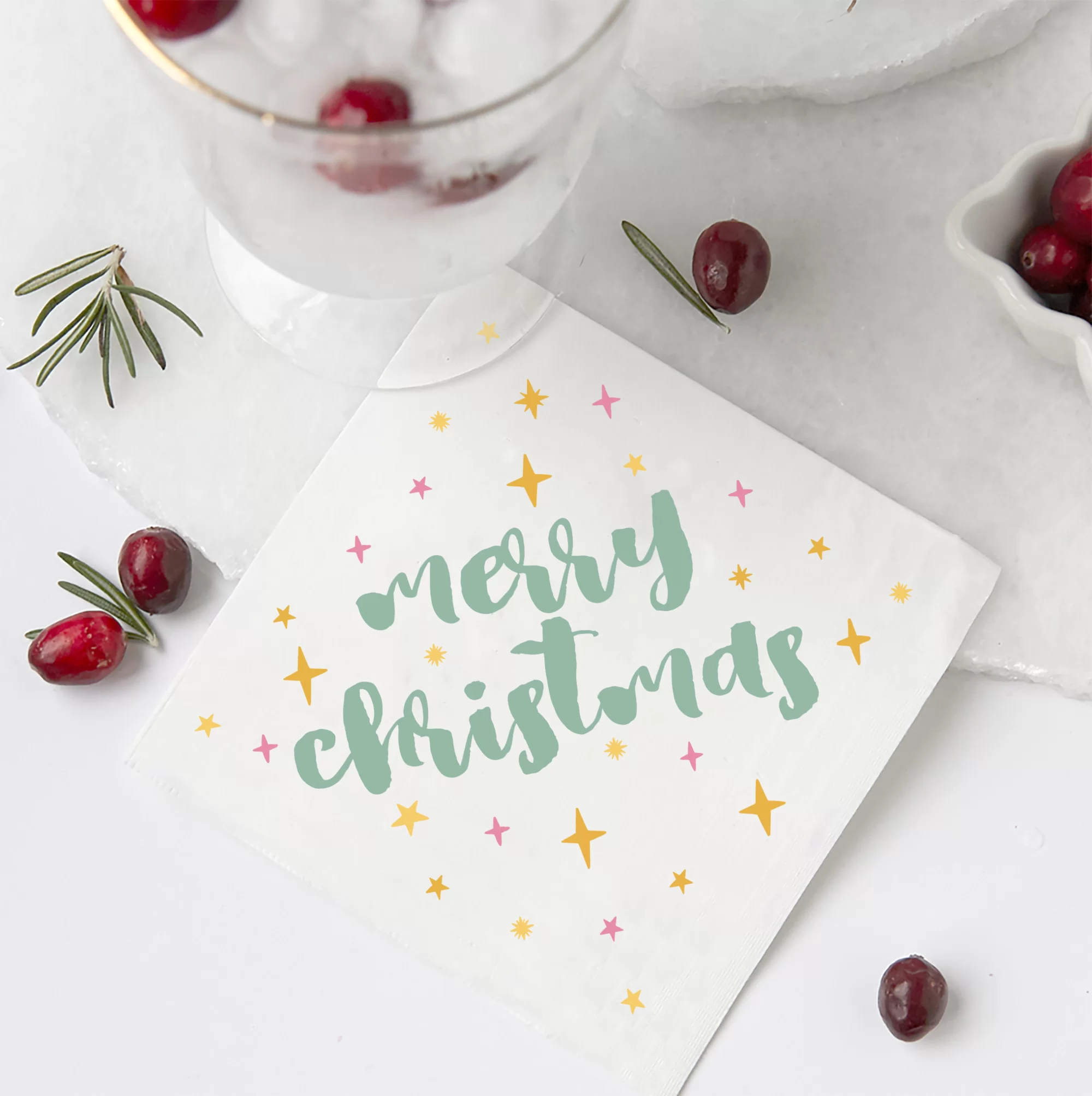 christmas napkins shown with a cocktail