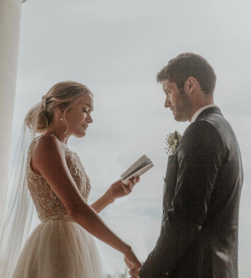 bride and groom saying their wedding vows