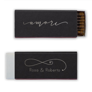 Custom Natural Black Candle Matchbox with Shiny Sterling Silver Foil Color has a Amore graphic and a Fancy Flourish 3 graphic and is good for use in Accents themed parties and can be personalized to match your party's exact theme and tempo.