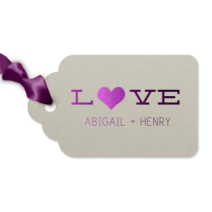 Tag your favors with the Love Heart Tag, where a stylized heart as the 'O' echoes the timeless beat—love is all you need. The couple's names below share this universal rhythm, making each gift a testament to love's power.