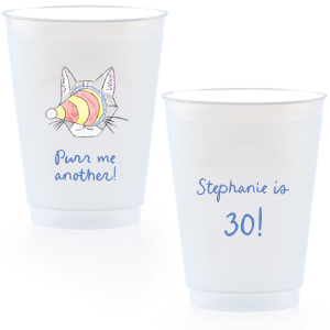 Embrace the festivity with the Purr Me Another Birthday Cup, featuring a vibrant illustration of a cat's face whimsically obscured by a party hat. The playful phrase "Purr me another." invites a celebratory mood, while the opposite side offers a space to customize with the name and age of the guest of honor, whether they're a person or a cherished pet.