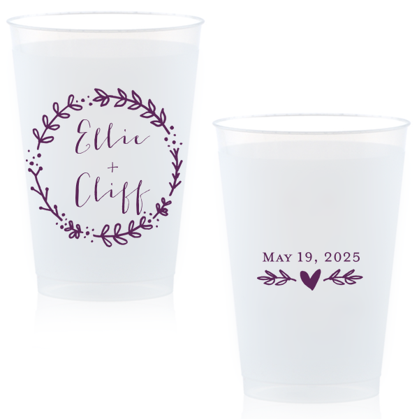 Raise a glass with the Wreath Names Cup where a playful leafy wreath lovingly encases your names. On the back, a branch with a centered heart underscores the date, infusing whimsy into every sip at your celebration.