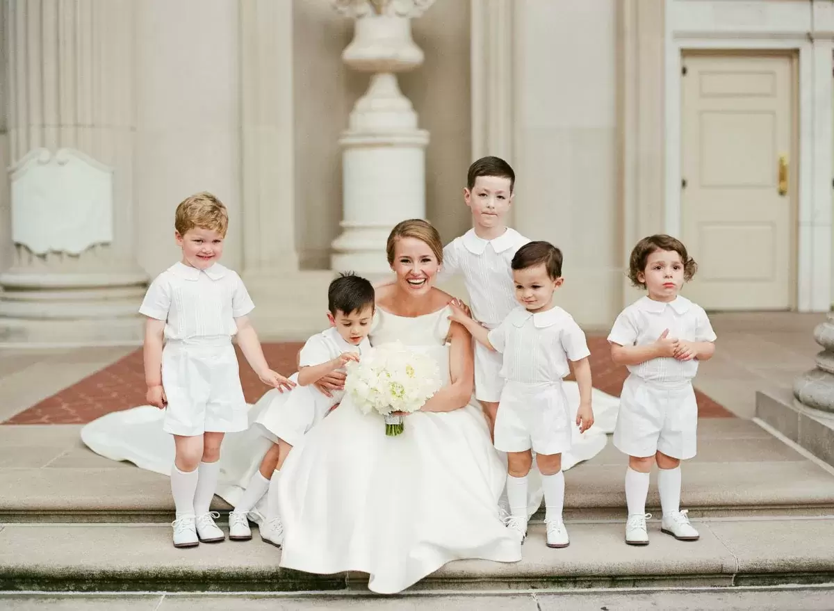 beautiful bride with ring bearers 