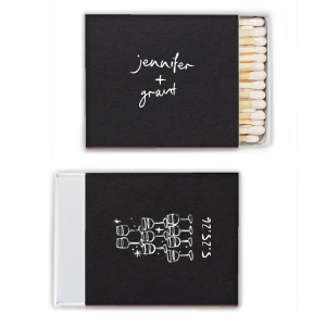  Light up the night with the Kitschy Cocktail Hour Toasting Glasses Matches, a whimsically modern addition to your wedding day. Each matchbox, personalized with the couple's names in a hand-drawn-inspired script, flips to reveal a contemporary line drawing of a wine glass pyramid and the date, perfect for commemorating your toast to forever.