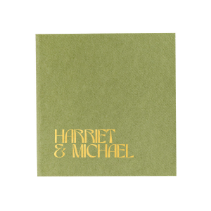 Celebrate your special day with the Marital Elegance Napkin, featuring the couple's names in a sophisticated and art deco inspired type that exudes modern elegance. A stylish and personal addition to your wedding reception.