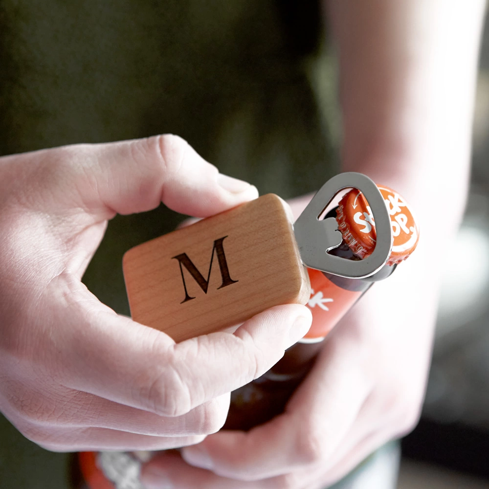 Custom initial bottle openers are perfect for stuffing those stockings this year.