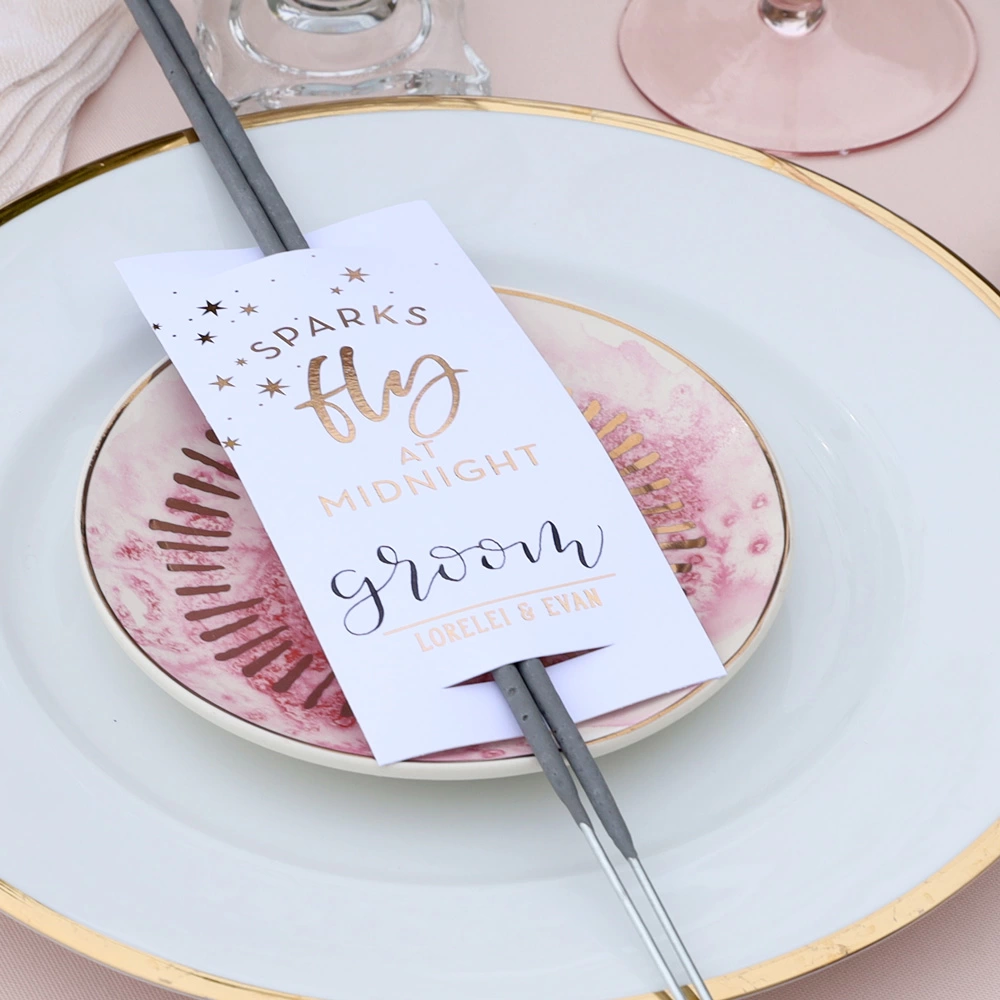 custom designed wedding sparkler sleeve on sweetheart table