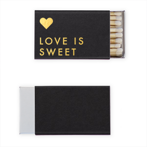 Celebrate the essence of love with the Love is Sweet Matchbox. Boldly declaring "Love is Sweet" with a floating heart above, this design captures the pure and heartfelt nature of love. A beautiful reminder that love, in all its complexity, is always sweet.