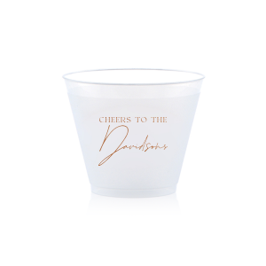 Raise a toast with the Boho Terracotta Cheers to the Wedding Cup, where rustic meets refinement. The phrase "Cheers to the" is beautifully presented in a classic serif font, inviting you to inscribe the couple's surname below in a sophisticated script. A cup that embodies the warmth and subtle drama of your autumnal nuptials.