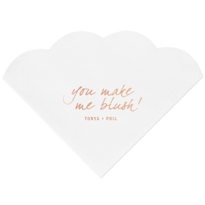 The Loving Blush Napkin exudes romantic charm. It features the phrase "you make me blush!" in a playful, lowercase script, capturing the essence of being touched by love and affection. Beneath, the couple’s names add a personal touch, beautifully embodying a moment of tender, loving emotion.
