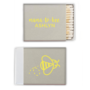 Strike up excitement for the 'Mama to Bee' with these adorable matches, buzzing with anticipation. The Mama to Bee Matchbox design has a sweet bee gracing the back, while the front honors the guest of honor, kindling joy for the baby's impending arrival.