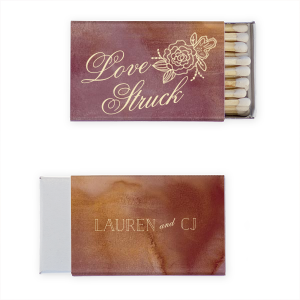 Ignite romance with the Love Struck Wedding Match. Featuring swirling, elegant script and a single peony, this design symbolizes happiness, romance, and prosperity. Perfect for celebrating love with a touch of timeless beauty.