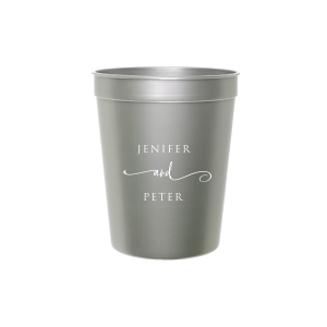 The Elegant Union Cup displays the couple's names, neatly stacked with artistic flair. A flowing flourish artistically intertwines the word 'and', adding a touch of whimsy. This design beautifully balances simplicity with a hint of fancy, making it a charming personalized detail for any event.