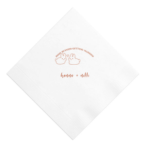 Hop into matrimonial joy with the Some Bunnies Wedding Napkin, complete with an adorable drawing of two bunnies and a heart nestled between them. The playful phrase "Some Bunnies Getting Married" sets a whimsical tone, while the area below awaits the couple's names, scripted with modern elegance. A delightful addition to your wedding tablescapes.