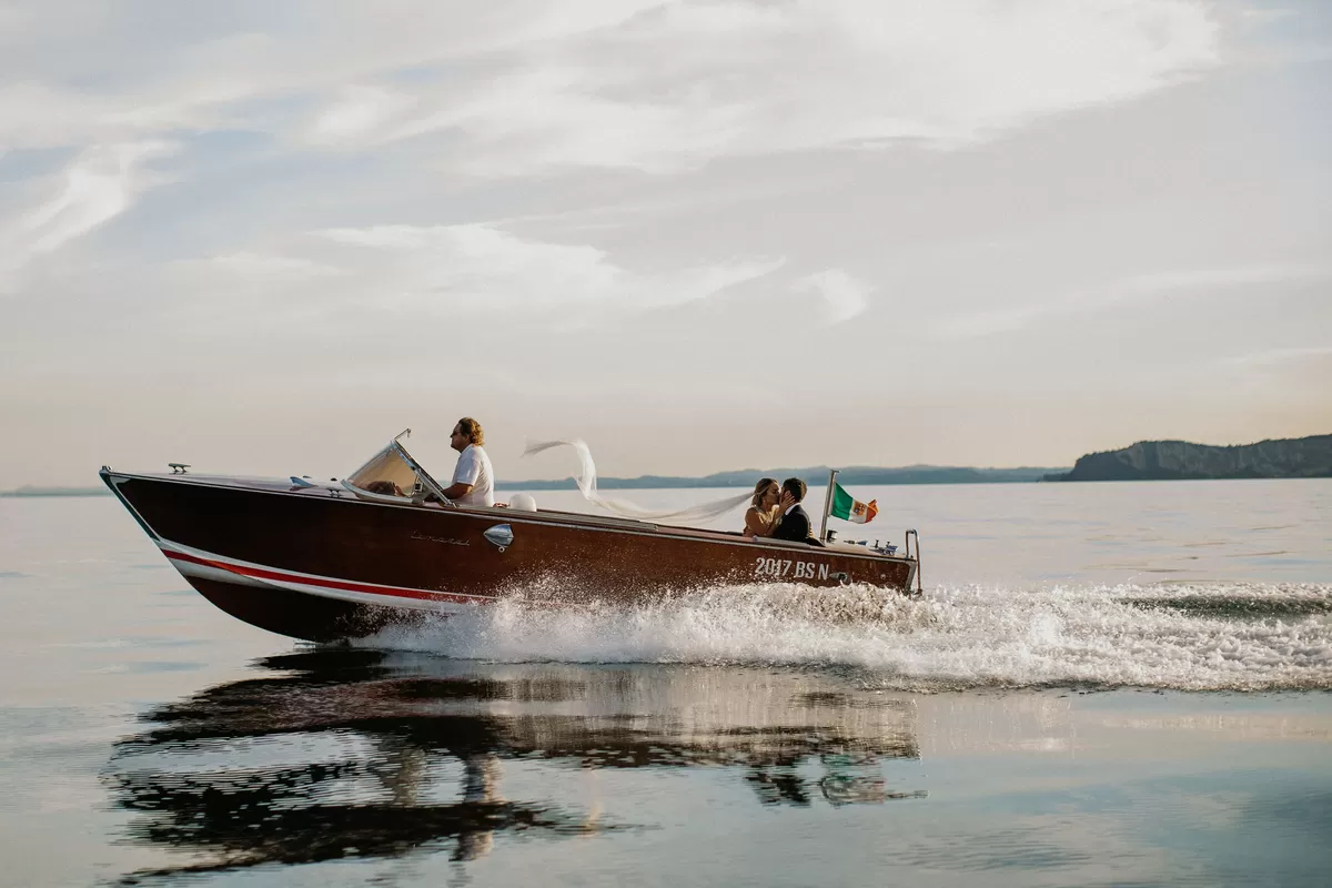 Brie Doffing wedding getaway boat photo