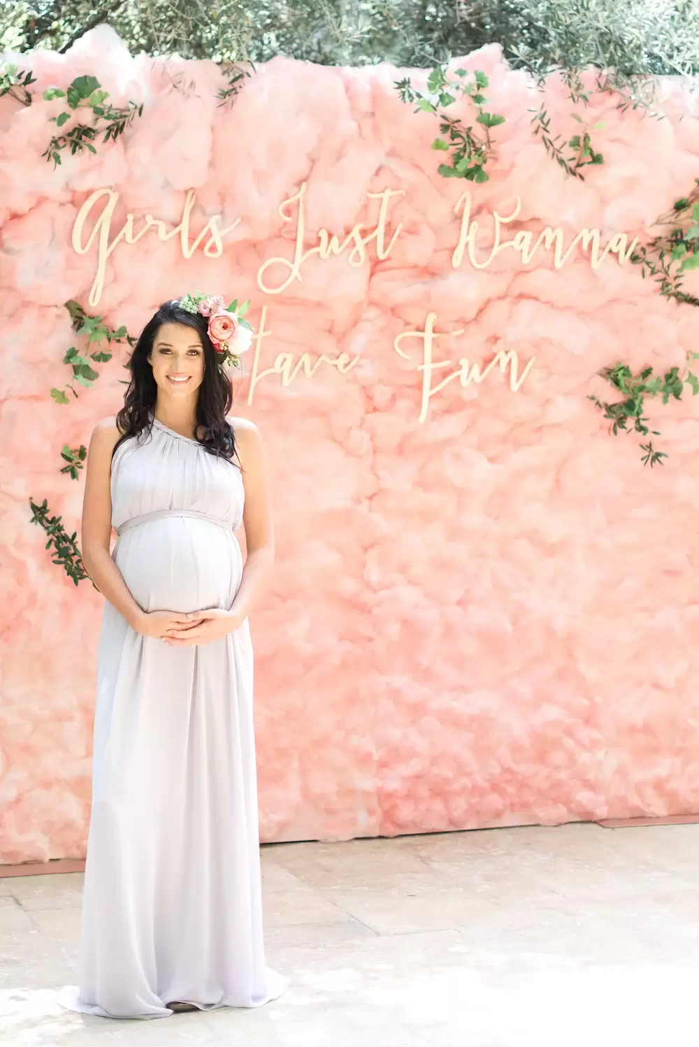 pink baby shower with cotton candy photo booth