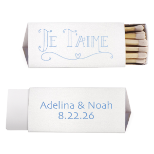 Kindle romance with the Je T'aime Match, whispering 'I love you' in French, adorned with a heartfelt flourish. This matchbox, bearing the couple's names and date, is a tender nod to love with a Parisian touch.