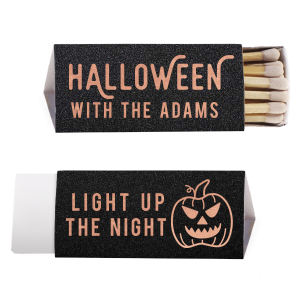 Illuminate your Halloween with the Light Up the Halloween Night Matchbox. One side showcases an eerie pumpkin graphic and the words "Light up the Night," sparking festive thrills. The reverse says "Halloween," with room for personalization—perfect for setting the mood at your spooky gathering! 