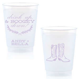 Kick up your heels with the Boogey Down Cowboy Cup emblazoned with 'Drink Up & Boogey Down!' and a foliage flourish. Personalized with your names and adorned with cowboy boots, it's perfect for a lively, Western-themed celebration.