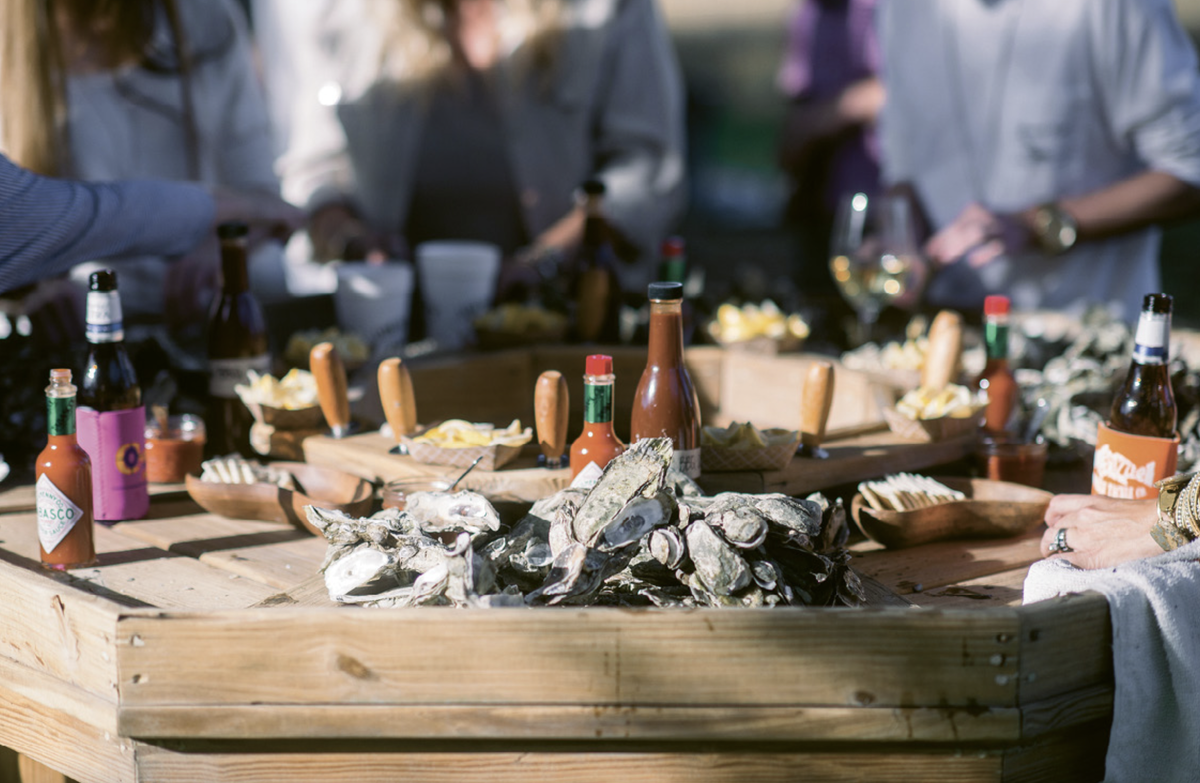 A backyard get together with custom can coolers!