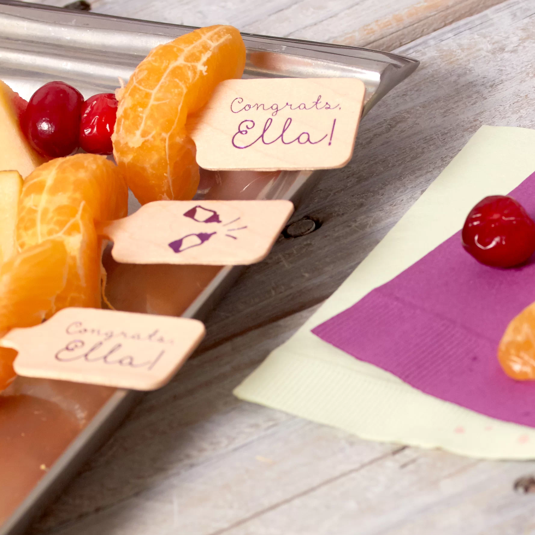 baby shower fruit kebobs with custom stir sticks