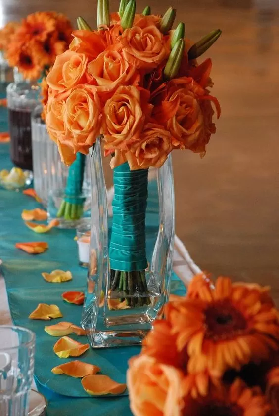 bright fall flowers with orange and teal