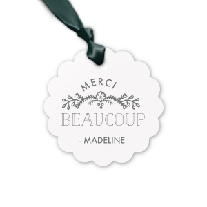 Elevate your gifting experience with our exquisite personalized gift tag, crafted using the timeless art of letterpress printing. This tag embodies elegance with a charming "Merci Beaucoup" message, perfect for expressing gratitude.