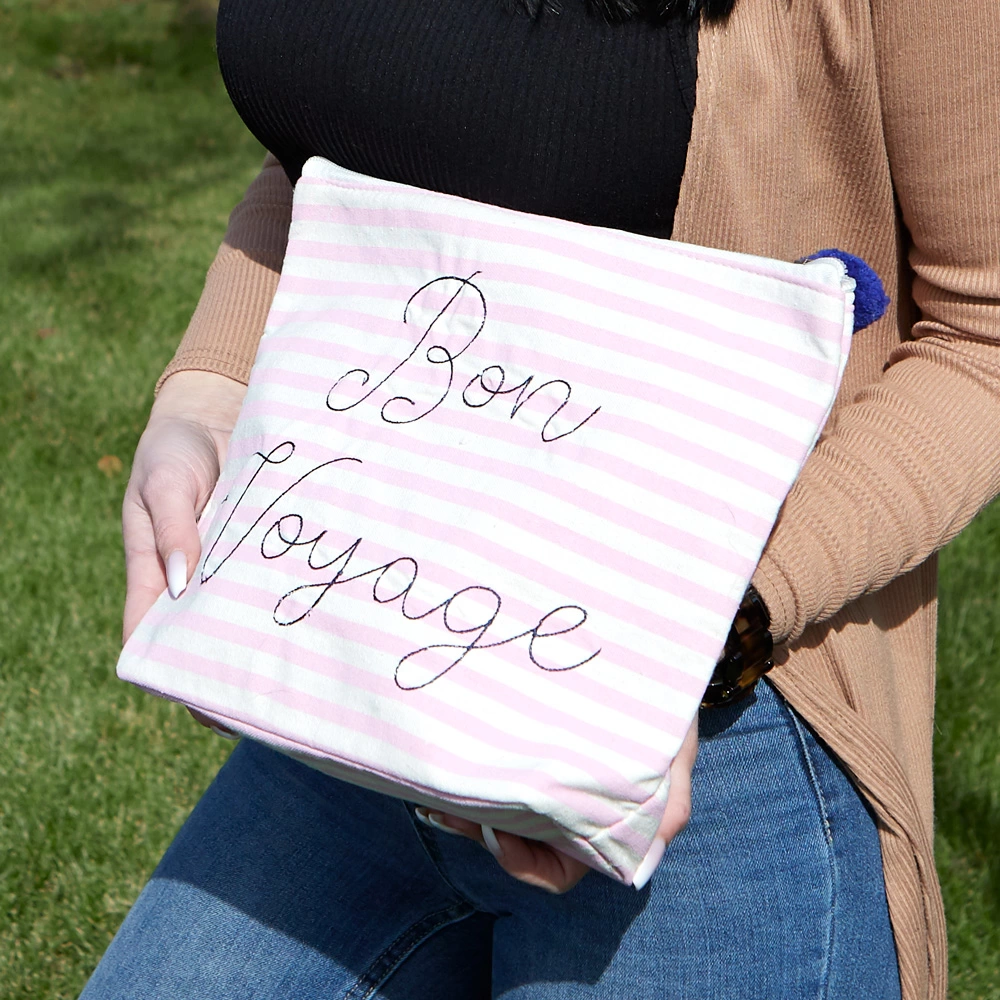 send your guests off in style with embroidered travel bags