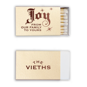 Spread the warmth with the Joy From Our Family Holiday Matchbox, featuring a grand 'Joy' in baroque flourish amid a sparkle of stars. 'From our Family To Yours' and the custom family name on the back light up every heart with a memorable glow.