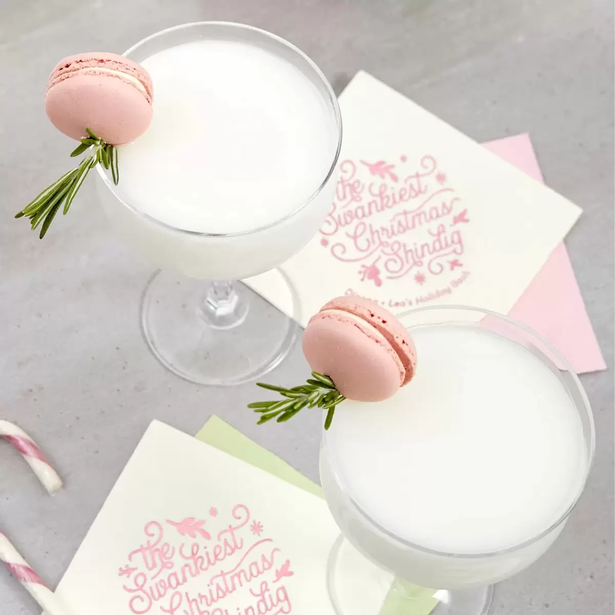 creamy rum cocktail recipe with rose syrup and a custom cocktail napkin