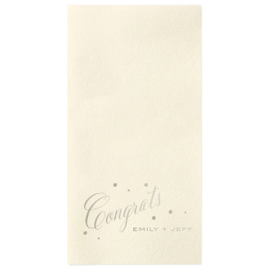 Celebrate special moments with the Small Confetti Dot Congrats Napkin, featuring 'Congrats' in an exuberant, flourished script, accentuated by fluttering dots that amplify its joyful energy. Below, the couple's names in simple block capitals add a grounding contrast, perfectly capturing the spirit of congratulations and celebration.