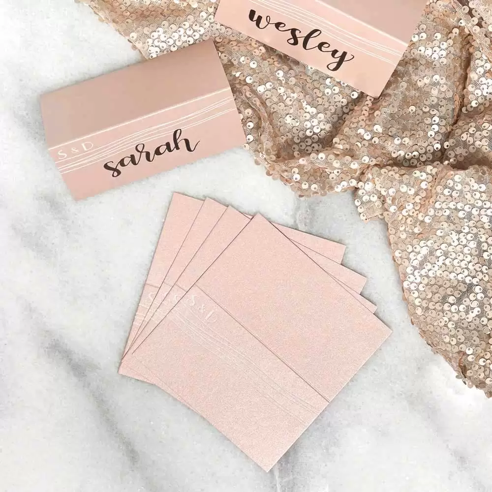 Shimmer cocktail napkins add texture to your neutral wedding color palette.