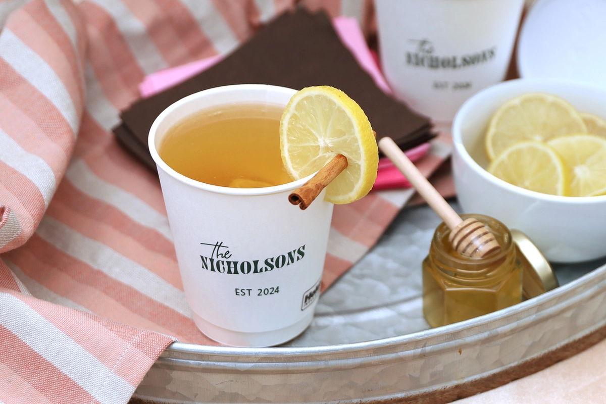 Paper cup with cider in it 