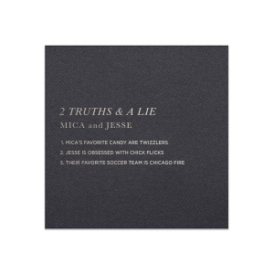 The Two Truths and a Lie Napkin energizes social interaction with its clever design. It features the game's title, the couple's names, and three statements for guests to decipher, blending decor with playful engagement and sparking lively conversations at each table.