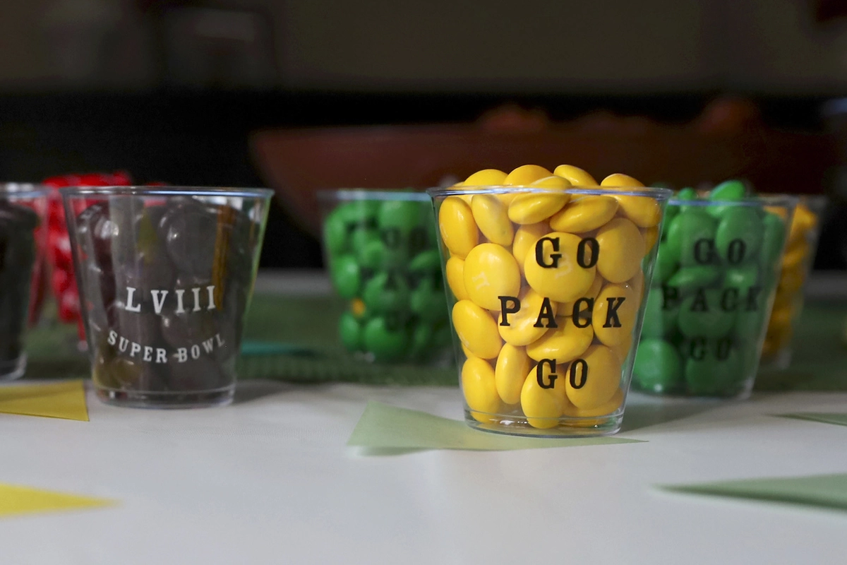 Custom plastic shot glass filled with candy