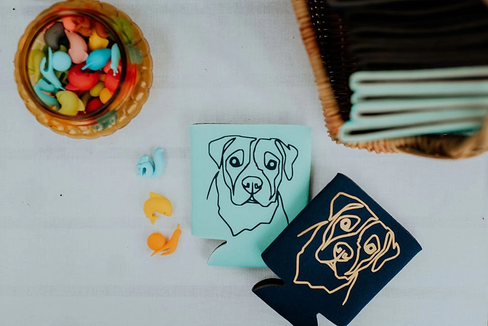 Adorable dog silhouettes on their can coolers