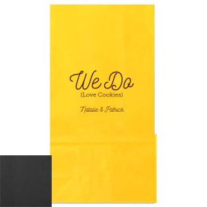 Celebrate sweet love with the We Do Love Cookies Bag, a delightful treat for sharing gifts with your guests. . It features a large, playful “We Do” at the top, with “(Love Cookies)” whimsically enclosed in parentheses below, expressing the couple’s fondness for cookies Or other gift item. Their names in candied script at the bottom add a charming touch to this gift.