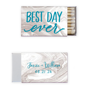 Declare your wedding the "Best Day Ever" with the Best Day Ever Wedding Matchbox. Featuring an exuberant exclamation across the front and the couple’s names with the wedding date in elegant script on the reverse, this design captures the joy and excitement of your special day. Perfect for lighting up the night and creating unforgettable memories.