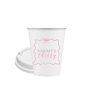 Sip in style at your birthday bash with the Ribbon Frame Birthday Bash Cup, elegantly framed like a ribbon and bow, featuring your name and new age in a whimsical script. A festive and personalized touch to celebrate another fabulous year.