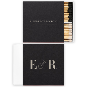 Celebrate your perfect union with the Swirl & Frame Wedding Match. A chic line frame encapsulates "A Perfect Match," while your initials are artfully linked by a sophisticated swirling ampersand. This stylish memento is ideal for illuminating your new beginning.