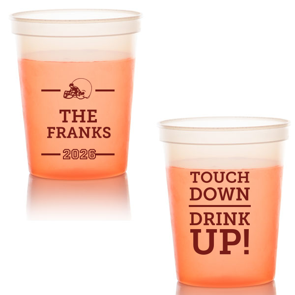 Elevate your game-day experience with the Touchdown Family Name Cup. One side boasts a helmet graphic, crowned by your family name and the season year stacked below. On game day toast to "Touchdown, Drink Up!" with each winning play—perfect for the ultimate football-loving hosts!