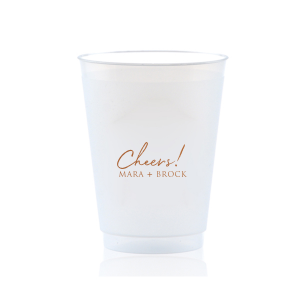 Raise a toast with the Cheers to the Couple Name Cup, where festivity meets elegance. A large, fanciful "Cheers!" in an exuberant script sets the stage for celebration, while the couple's names in bold capitals underscore the personal touch. This frosted cup's simple yet impactful design perfectly encapsulates the spirit of a joyous toast to love and unity.