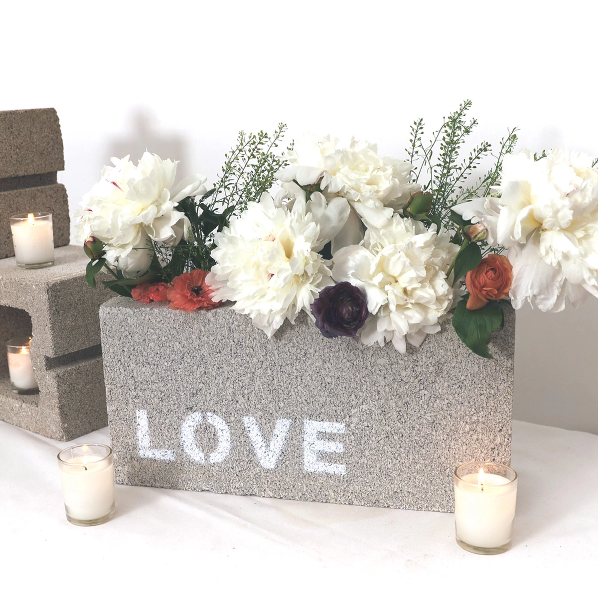 simple flower bouquets tucked in urban wedding décor