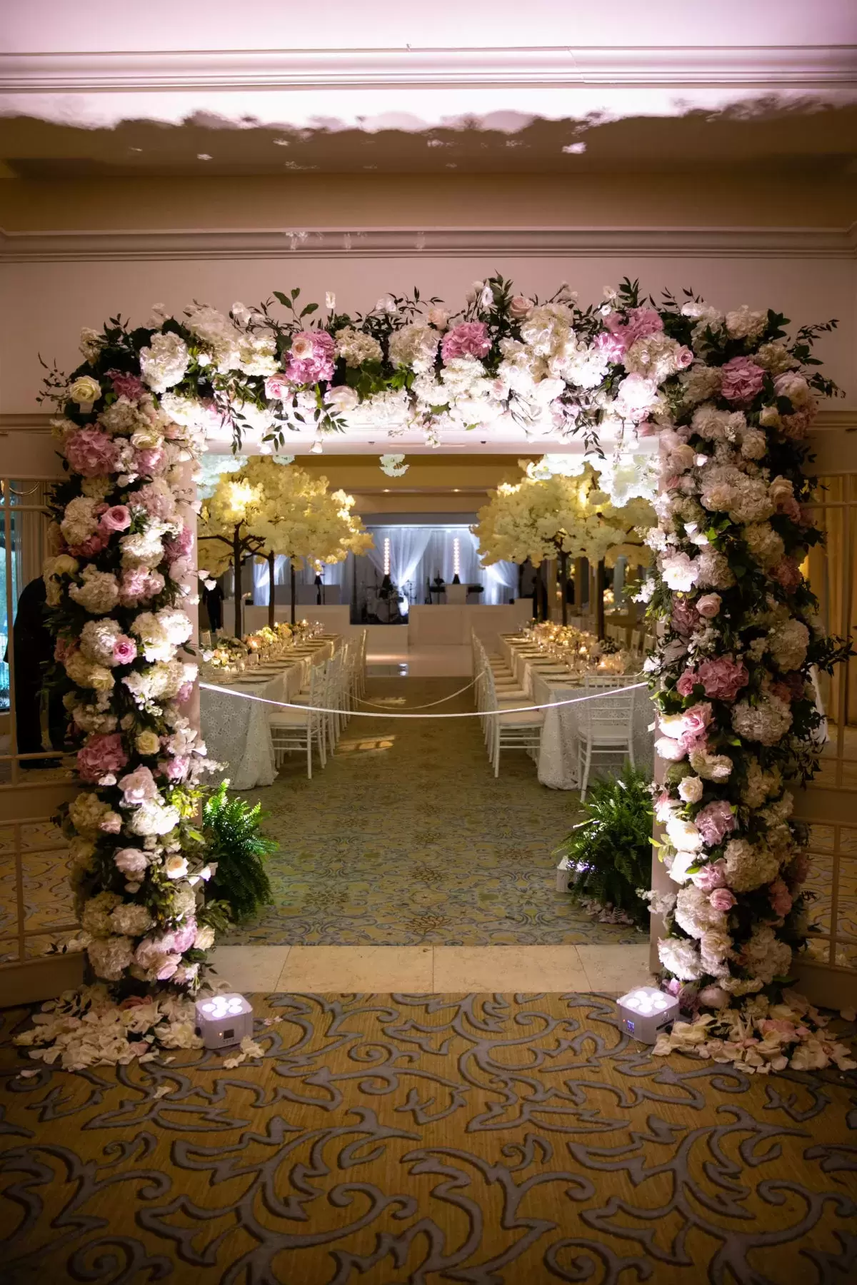floral archway at Preppy Pink Luxury wedding