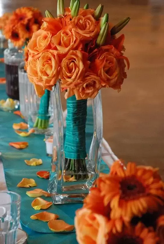 bright fall flowers with orange and teal