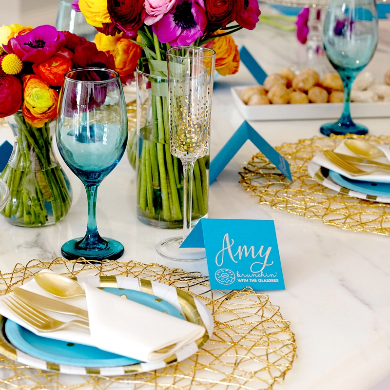 cute brunch table with bright flowers
