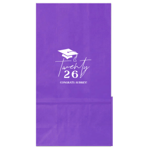 Honor the graduate's milestone with the Grad Script Cap Celebration Bag, elegantly personalized with the graduate's name and graduation year in flowing script, complemented by a classic graduation cap graphic. A chic and functional memento for any graduation festivity.